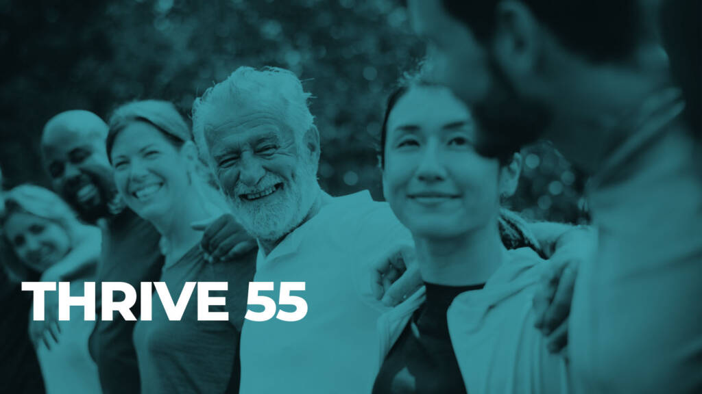 Smiling diverse adults embrace beneath Thrive 55 text