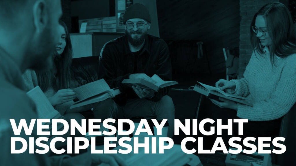Group reading books at Wednesday night discipleship classes